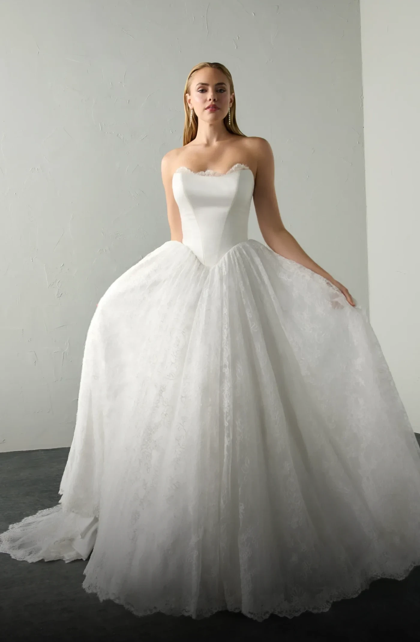 Model wearing a gown by Justin Alexander