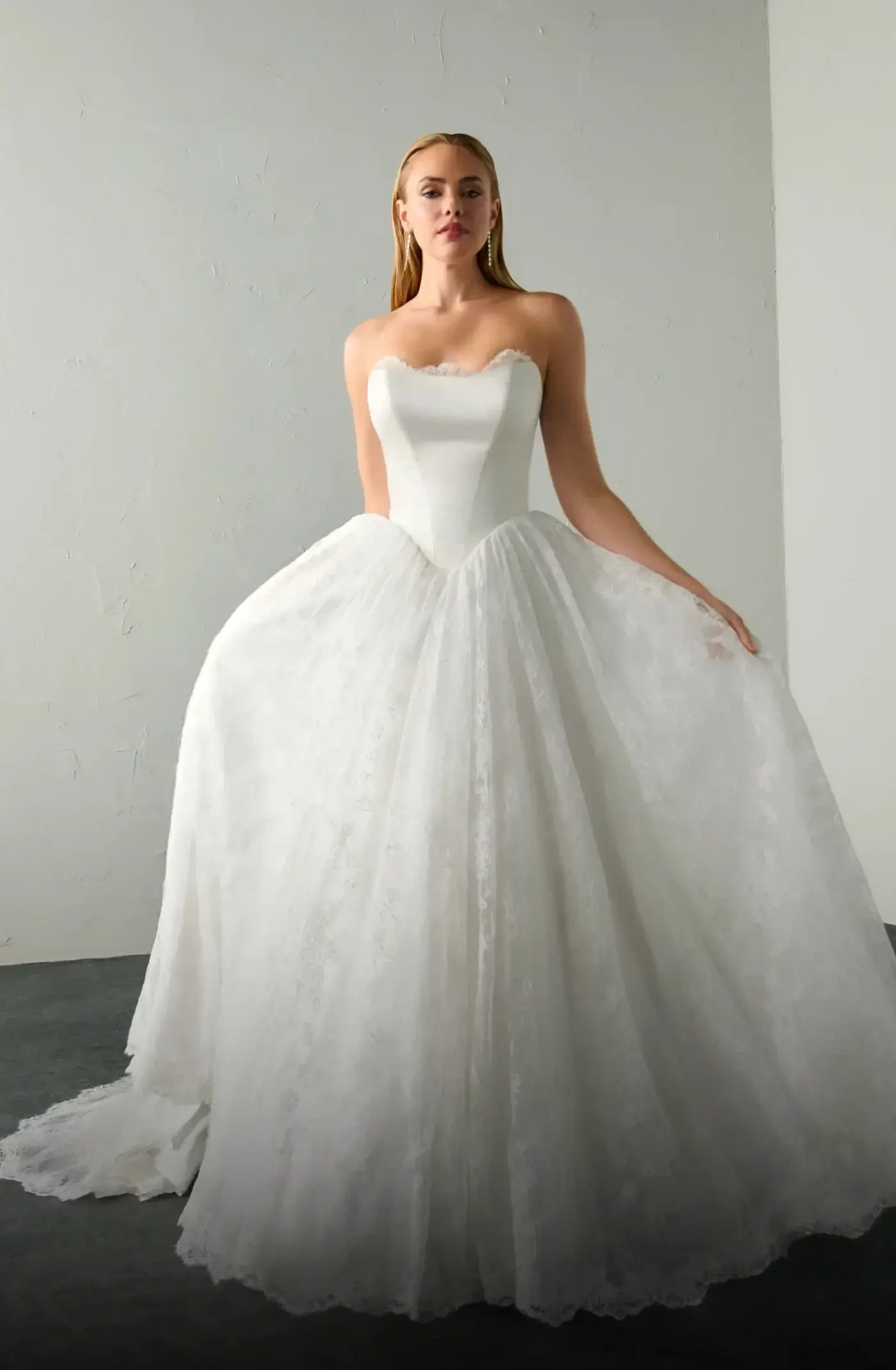 Model wearing a gown by Justin Alexander